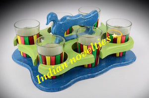 Glass cups with wooden tray